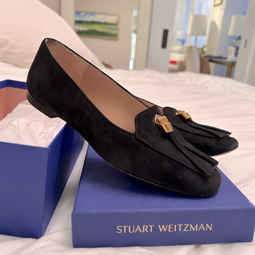 Black suede loafers by Stuart Weitzman